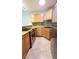 Updated kitchen featuring stainless steel appliances, and mosaic backsplash at 3315 58Th S Ave # 115, St Petersburg, FL 33712