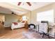 Bedroom featuring ceiling fan and a versatile layout, designed for relaxation and productivity at 4018 E Bluff Ave, Tampa, FL 33617
