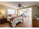 Cozy bedroom featuring ample natural light and an additional work area at 4018 E Bluff Ave, Tampa, FL 33617