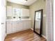 Bright, flexible room with natural light, built-in storage, and durable flooring at 4018 E Bluff Ave, Tampa, FL 33617