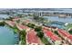 Overhead view of a waterfront community featuring tennis courts, docks and tranquil waterways at 459 Haven Point Dr, Treasure Island, FL 33706