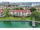 Waterfront condos featuring balconies, lush lawns, and scenic water views at 459 Haven Point Dr, Treasure Island, FL 33706