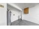 Unfinished basement with a utility sink and water heater, offering potential for customization and storage at 459 Haven Point Dr, Treasure Island, FL 33706