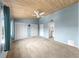 Large bedroom with wood ceiling, two closets, ceiling fan, and a connected bathroom creates a suite at 459 Haven Point Dr, Treasure Island, FL 33706