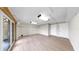 Bonus room with neutral walls, ductless AC and sliding glass door to outdoor living space at 459 Haven Point Dr, Treasure Island, FL 33706