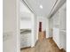 Walk-in closet has custom shelving and drawer systems at 459 Haven Point Dr, Treasure Island, FL 33706