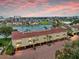 Waterfront townhouse offers picturesque coastal living with views of the harbor and vibrant sunsets at 459 Haven Point Dr, Treasure Island, FL 33706