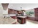Spacious kitchen with island, granite counters, and stainless steel appliances at 459 Haven Point Dr, Treasure Island, FL 33706