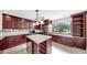 Well-appointed kitchen featuring ample cabinet space, island, and natural lighting at 459 Haven Point Dr, Treasure Island, FL 33706
