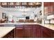 Granite countertops and a large island provide ample space in the beautifully designed kitchen at 459 Haven Point Dr, Treasure Island, FL 33706