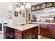 Granite counters and built-in wine storage add character to this well appointed kitchen space at 459 Haven Point Dr, Treasure Island, FL 33706