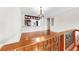 Open living space with gleaming hardwood floors and a view of the updated kitchen at 459 Haven Point Dr, Treasure Island, FL 33706