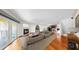 Bright open living room offers a fireplace, hardwood floors, and an open floor plan at 459 Haven Point Dr, Treasure Island, FL 33706