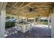 Community outdoor kitchen and seating area, perfect for gatherings at 459 Haven Point Dr, Treasure Island, FL 33706