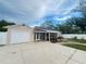 Charming single-story home features a front porch, garage, and a spacious driveway at 4616 5Th N Ave, St Petersburg, FL 33713