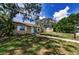 A view of a quaint home featuring a well-maintained yard and inviting walkway at 4616 5Th N Ave, St Petersburg, FL 33713