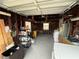 Spacious garage featuring shelving and storage, plus a washer and dryer hook up at 4616 5Th N Ave, St Petersburg, FL 33713