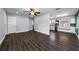 Spacious living room with hardwood floors, neutral walls, and open flow to the updated kitchen at 4616 5Th N Ave, St Petersburg, FL 33713