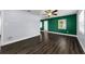 A stylish living room showcases hardwood floors, a ceiling fan, and a modern, open floor plan at 4616 5Th N Ave, St Petersburg, FL 33713