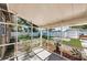 Rear porch with a view of the fenced backyard with plants and shrubbery at 4616 5Th N Ave, St Petersburg, FL 33713