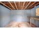 Unfinished basement with exposed ceiling and cinder block walls offers potential for customization at 4816 N Fremont Ave, Tampa, FL 33603