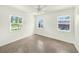 Well-lit bedroom with multiple windows and neutral tones at 4816 N Fremont Ave, Tampa, FL 33603