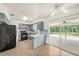 Modern kitchen with stylish cabinets, marble countertops, and stainless steel appliances at 4816 N Fremont Ave, Tampa, FL 33603