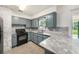 Updated kitchen featuring modern cabinets and countertops at 4816 N Fremont Ave, Tampa, FL 33603