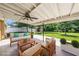 Covered patio with outdoor seating area at 4816 N Fremont Ave, Tampa, FL 33603