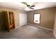 Spacious bedroom with natural light and carpet floors at 5812 Montana Ave, New Port Richey, FL 34652