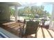 Relaxing view from the front porch, showcasing comfortable seating and tropical landscaping at 6045 2Nd N Ave, St Petersburg, FL 33710
