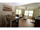Bright and airy living room with large windows, a comfortable sofa, and a cozy atmosphere at 6045 2Nd N Ave, St Petersburg, FL 33710