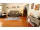 Inviting living room featuring hardwood floors, a comfortable sofa, and tasteful decor at 6045 2Nd N Ave, St Petersburg, FL 33710