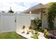 Well maintained yard featuring a privacy fence, tropical landscaping, and lush lawn at 6045 2Nd N Ave, St Petersburg, FL 33710