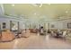 Spacious community room with ample seating and natural light, perfect for gatherings and socializing at 6519 Watson Rd, Riverview, FL 33578