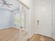 Bright entryway featuring wood floors and a view into the adjacent living space at 6519 Watson Rd, Riverview, FL 33578