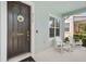 Cozy front porch with rocking chairs, offering a relaxing outdoor space at 6519 Watson Rd, Riverview, FL 33578