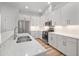 Well-appointed kitchen featuring modern appliances, white countertops, and ample cabinetry at 6519 Watson Rd, Riverview, FL 33578