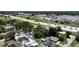 Aerial view of a residential neighborhood with highway and commercial area in the background at 708 E Annie St, Tampa, FL 33612