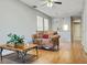 Bright living room boasts wood floors and an open floor plan at 7148 E Bank Dr # 7148, Tampa, FL 33617