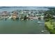 Beautiful waterfront home on a tranquil bay with private docks, in a picturesque neighborhood at 8 Sunset Bay Dr, Belleair, FL 33756