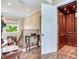 Interior view of an elevator with wood panels and gold trim at 8 Sunset Bay Dr, Belleair, FL 33756