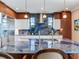 Gourmet kitchen with granite counters, stainless steel appliances, and ample cabinet space at 8 Sunset Bay Dr, Belleair, FL 33756