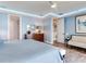 Stylish main bedroom with modern lighting and decor, creating a cozy and inviting atmosphere at 8 Sunset Bay Dr, Belleair, FL 33756