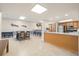 Entertain in the community room, featuring a kitchen, tables, and bar seating at 80 Rogers St # 3A, Clearwater, FL 33756