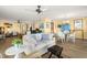 Spacious living area with comfortable seating and stylish decor, creating a warm and inviting atmosphere at 80 Rogers St # 3A, Clearwater, FL 33756