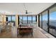 Open-concept living area with views of the water, plenty of light, and stylish decor at 80 Rogers St # 3A, Clearwater, FL 33756