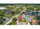A high angle view shows a home in a community close to neighborhood amenities at 8005 Pepperidge Ln, Port Richey, FL 34668