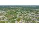 Beautiful aerial view showcasing community near theme parks and a nearby river, with trees everywhere at 8502 N Hyaleah Rd, Tampa, FL 33617