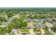 Aerial view of residential neighborhood with mature trees and well-maintained homes at 8502 N Hyaleah Rd, Tampa, FL 33617